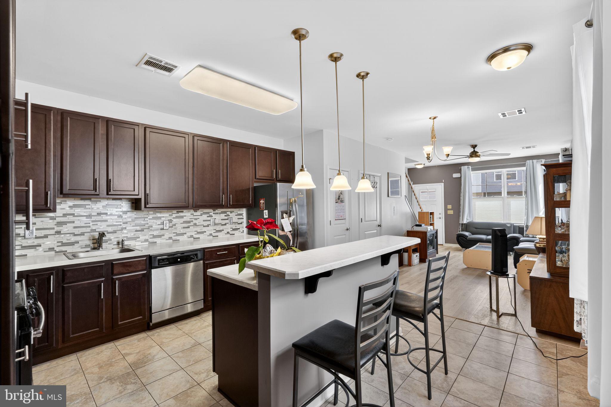 33 Rowand Way East Clementon, NJ 08021 - Photo 6 of 15 a kitchen with a table and chairs in it