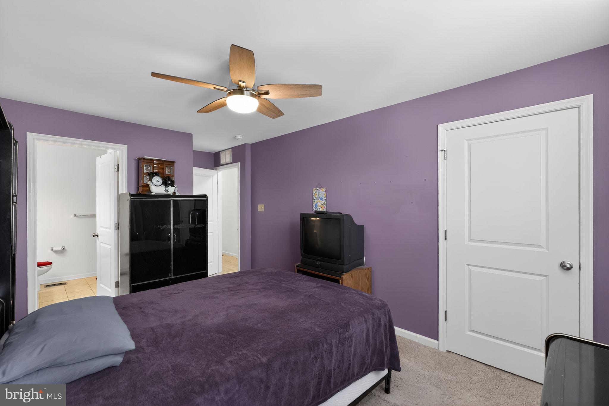 33 Rowand Way East Clementon, NJ 08021 - Photo 9 of 15 a bed room with a bed and a television