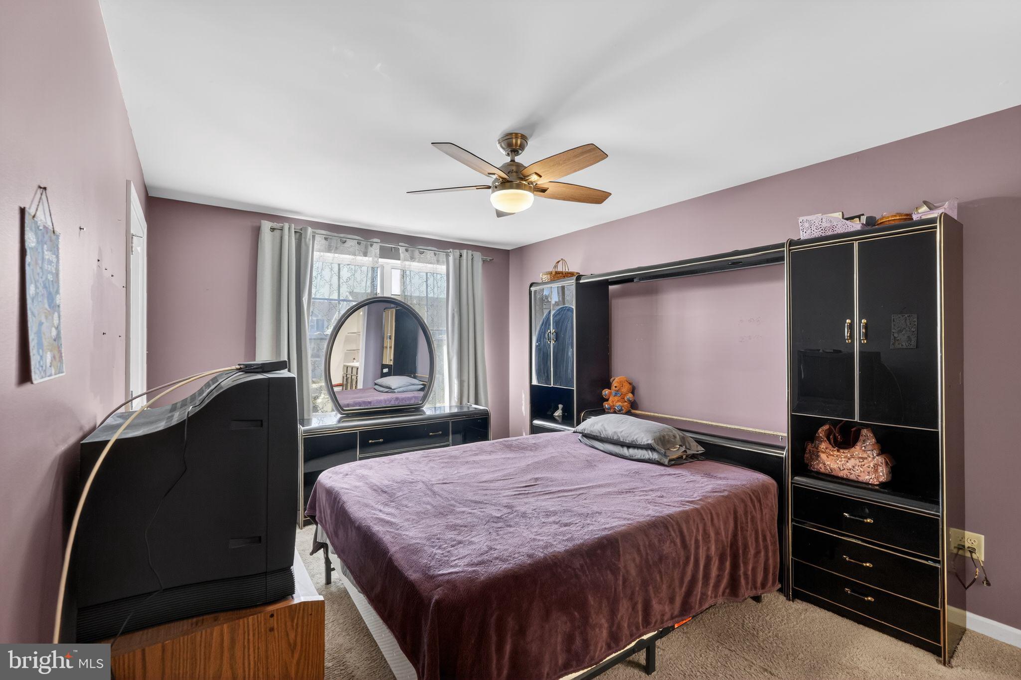 33 Rowand Way East Clementon, NJ 08021 - Photo 10 of 15 a bedroom with a bed and a dresser with mirror