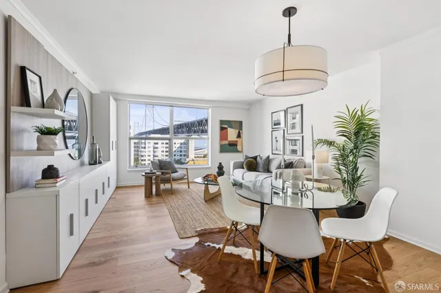 a view of a dining room with furniture window and outside view