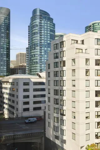 a view of a building and car parked