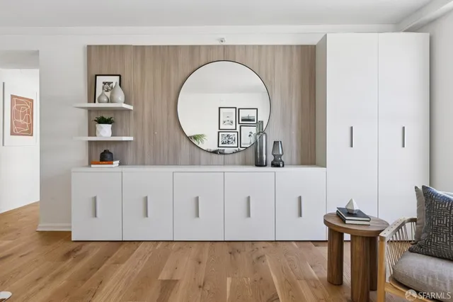 a view of a livingroom with furniture and wooden floor