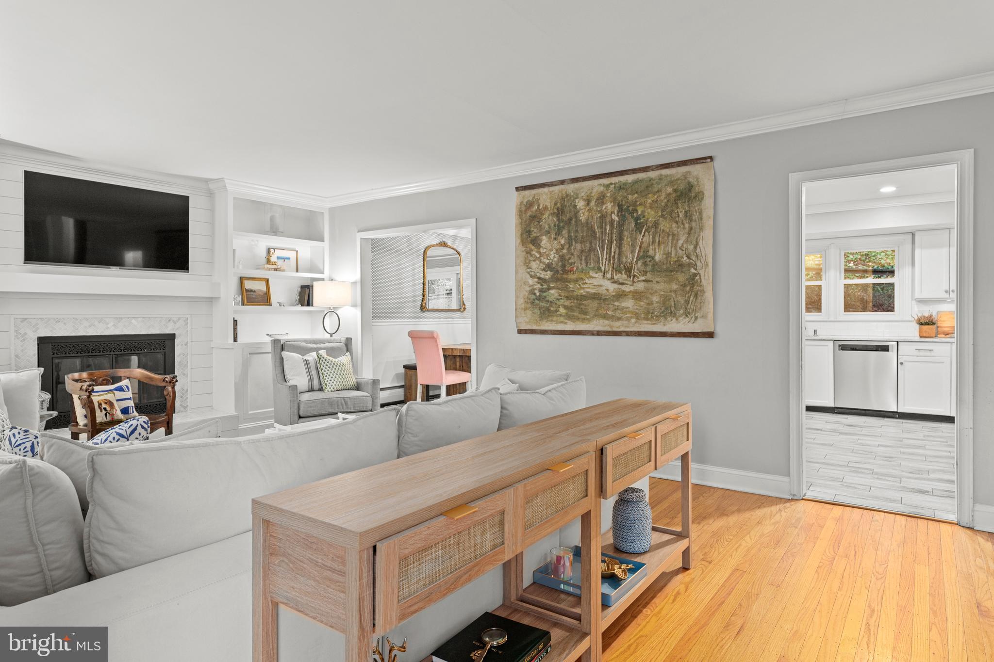 476 Upper Weadley Road Wayne, PA 19087 - Photo 11 of 45 a living room with furniture and a flat screen tv