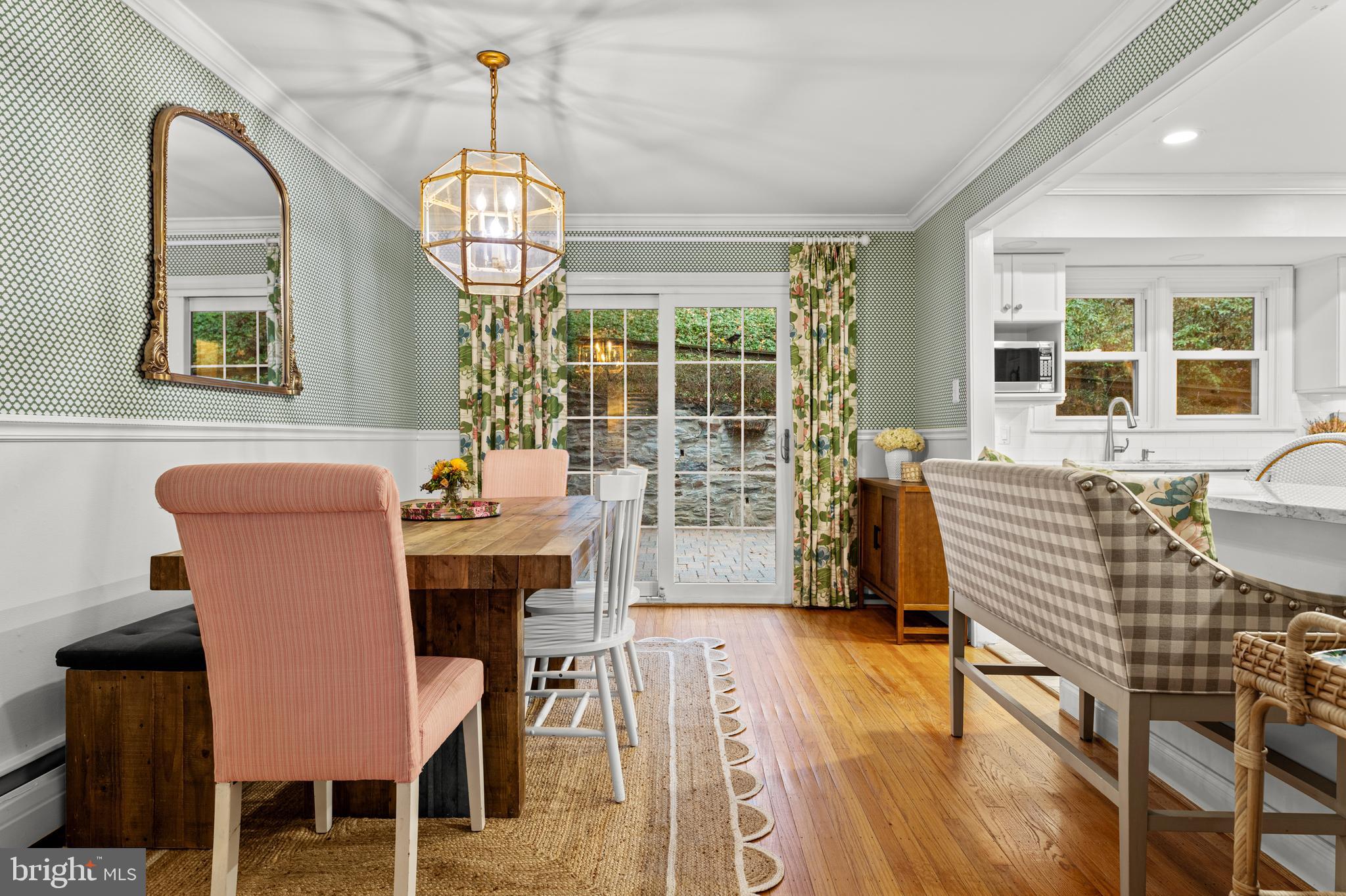 476 Upper Weadley Road Wayne, PA 19087 - Photo 19 of 45 a dining room with furniture a chandelier and wooden floor