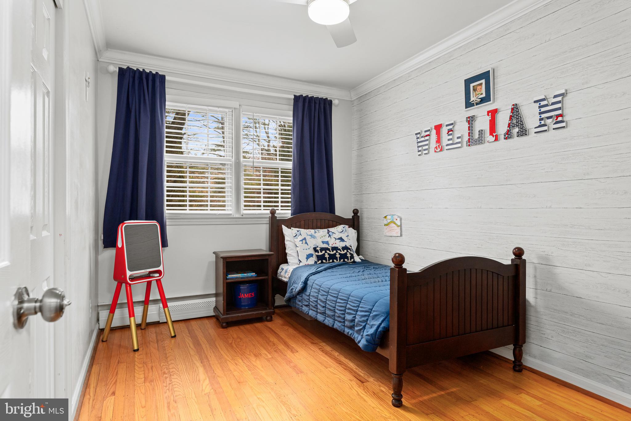 476 Upper Weadley Road Wayne, PA 19087 - Photo 28 of 45 a bedroom with a bed and a window