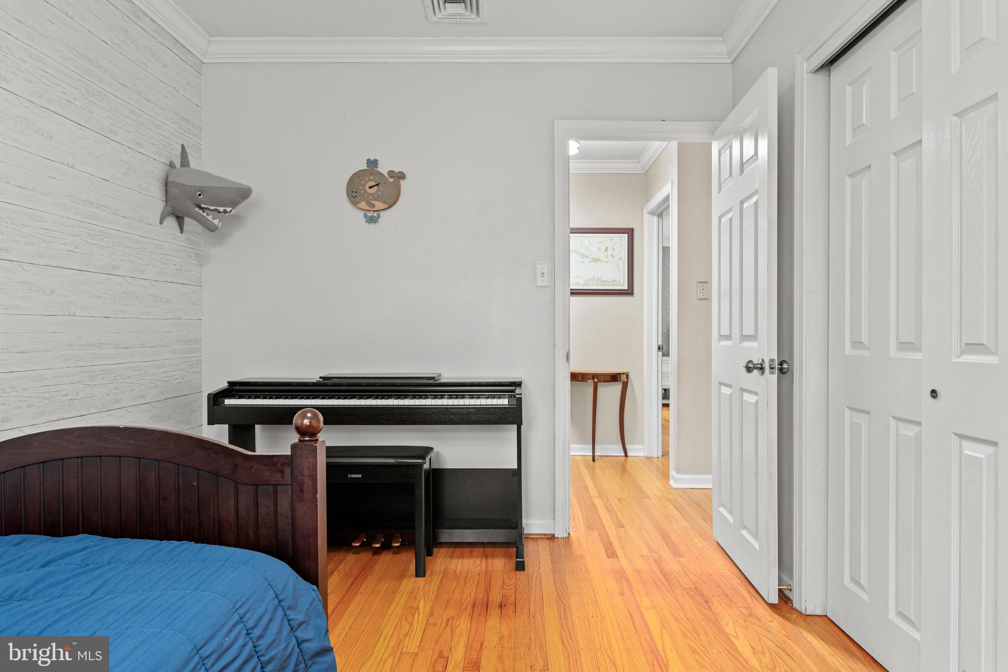 476 Upper Weadley Road Wayne, PA 19087 - Photo 29 of 45 a bedroom with a bed and a dresser