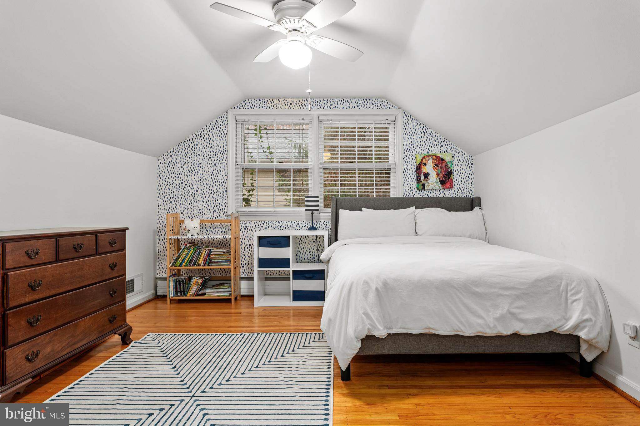 476 Upper Weadley Road Wayne, PA 19087 - Photo 33 of 45 a bedroom with a bed and a window