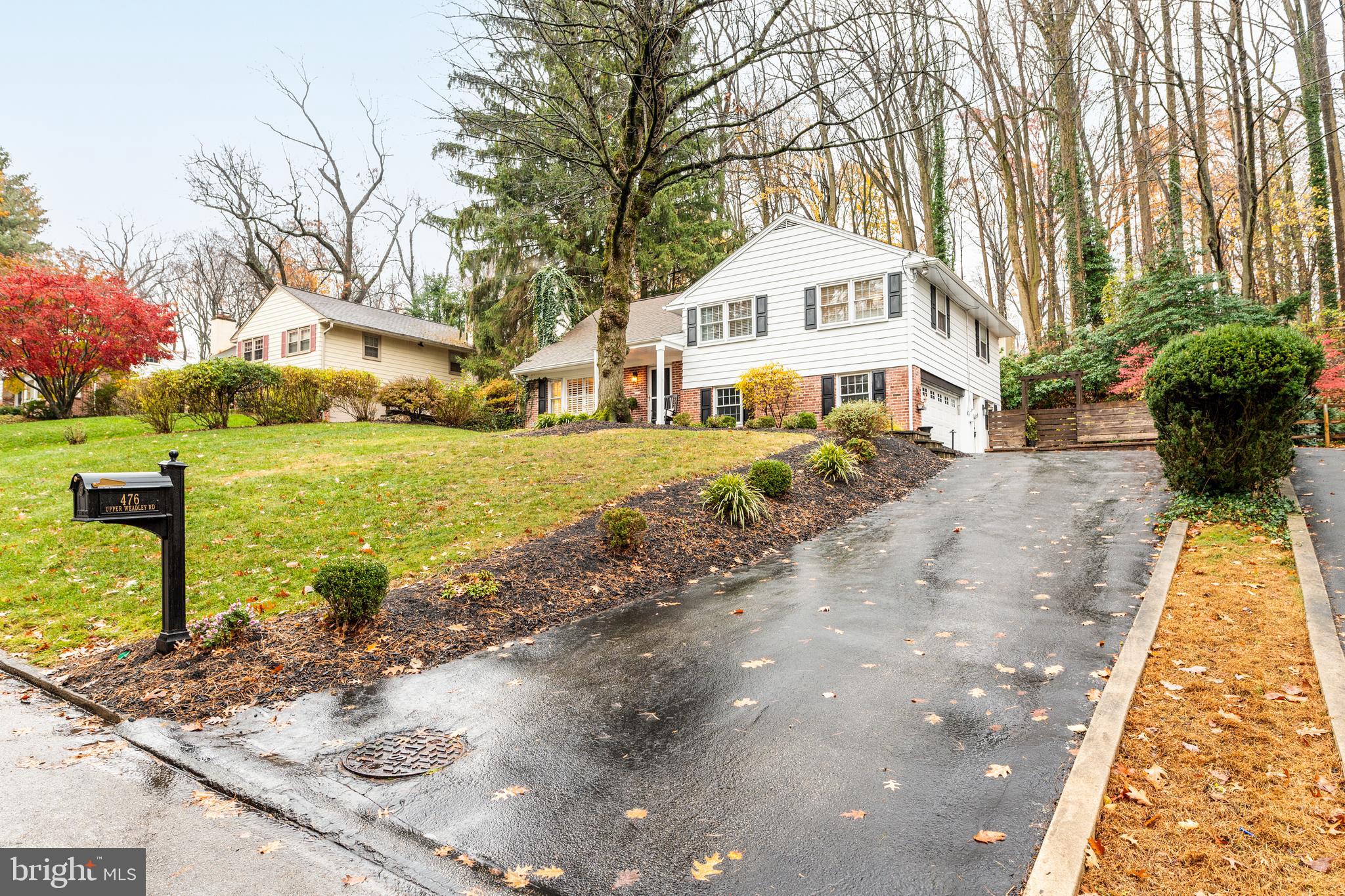 476 Upper Weadley Road Wayne, PA 19087 - Photo 45 of 45 a front view of a house with garden