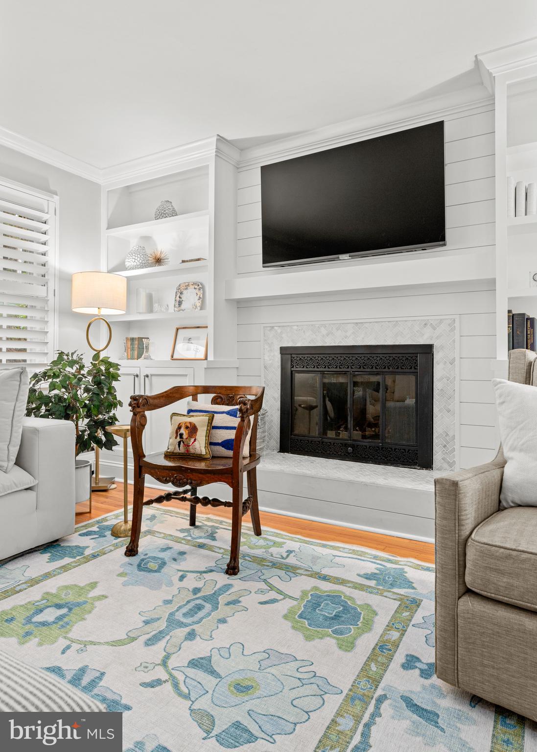 476 Upper Weadley Road Wayne, PA 19087 - Photo 9 of 45 a living room with furniture and a flat screen tv