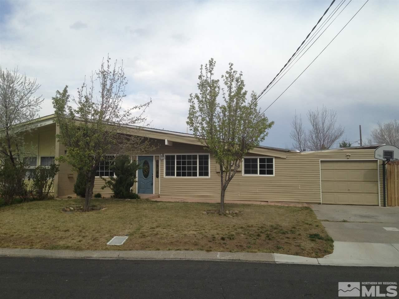 11150 Andes Street Reno, NV 89506 - Photo 1 of 1 a view of a house with a yard