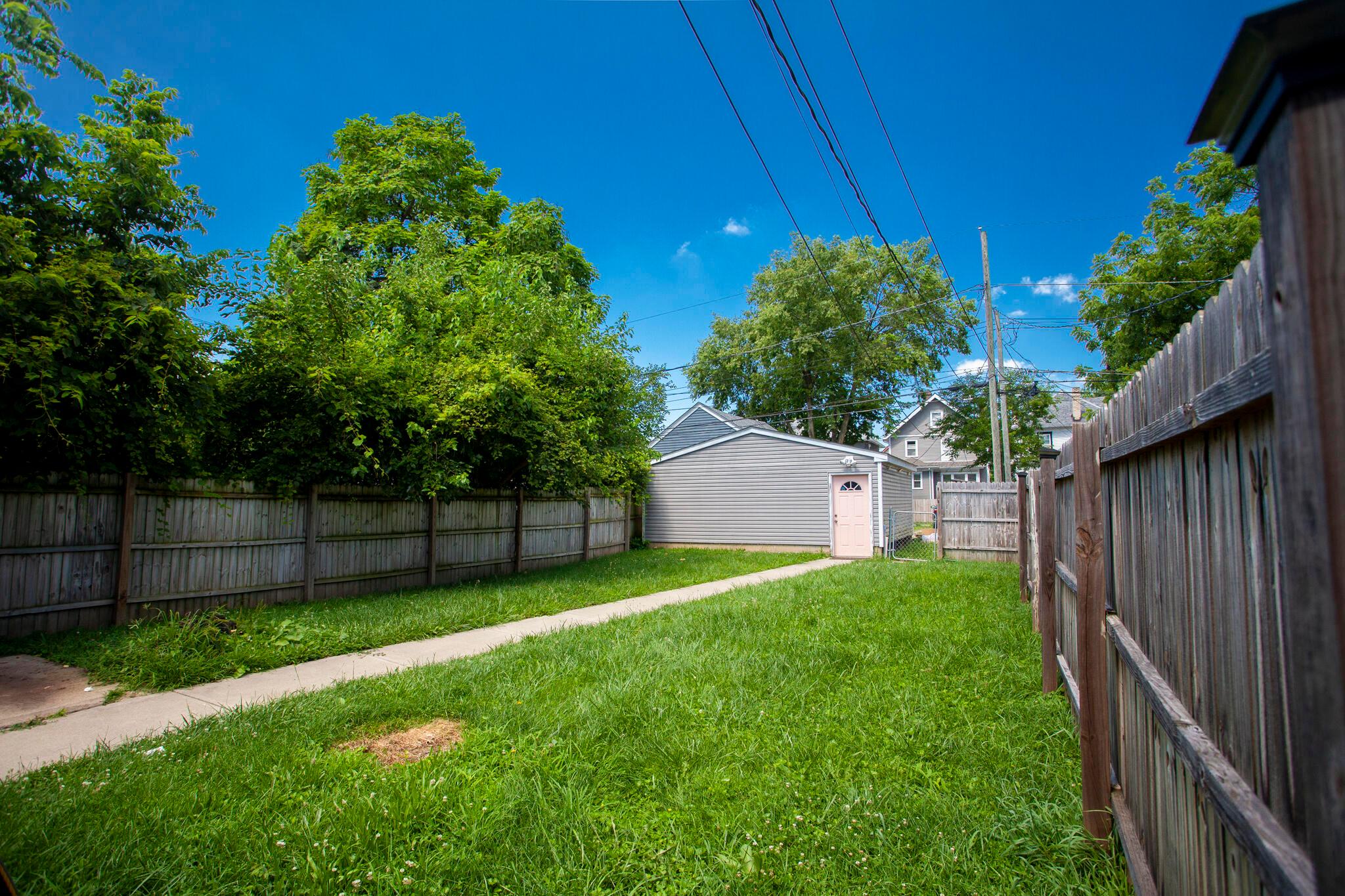 929 Lockbourne Road Columbus, OH 43206 - Photo 4 of 20 Fenced yard and 2-car garage.
