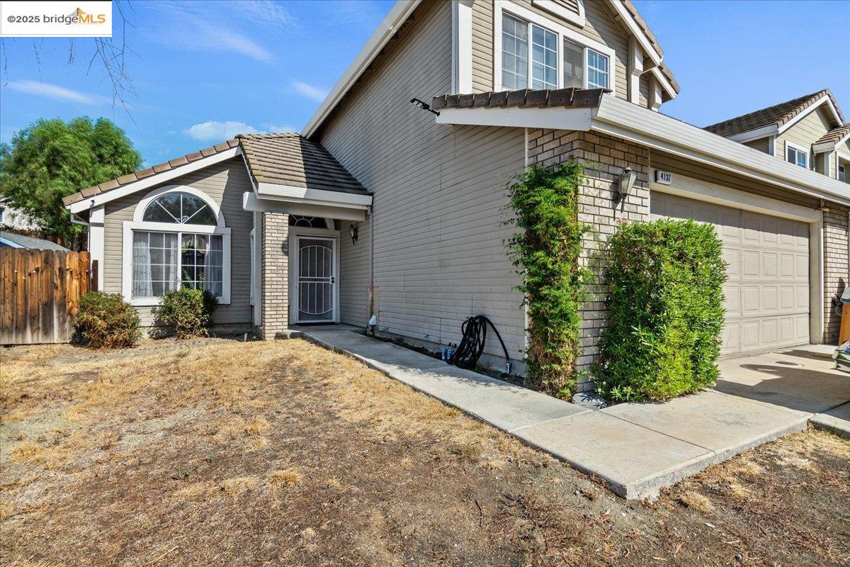 4137 Amargosa Drive Antioch, CA 94531 - Photo 1 of 31 a view of a house with backyard and plants
