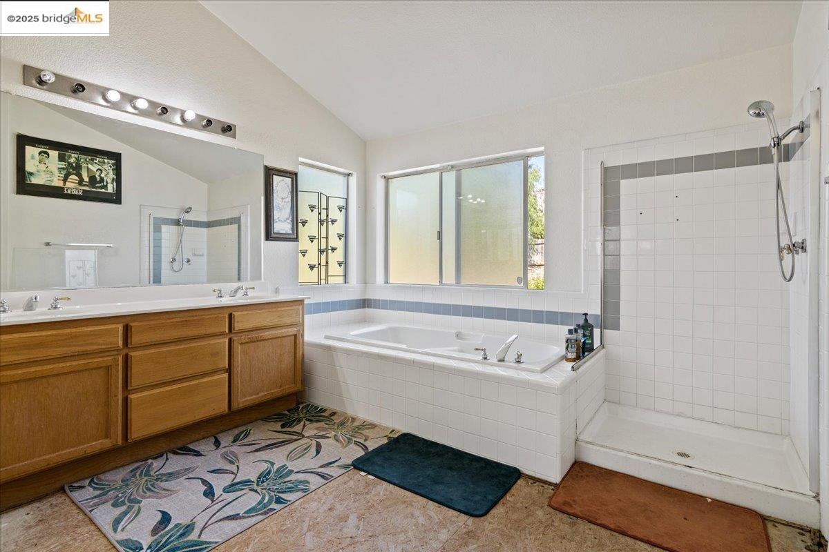 4137 Amargosa Drive Antioch, CA 94531 - Photo 23 of 31 a spacious bathroom with a tub sink and mirror