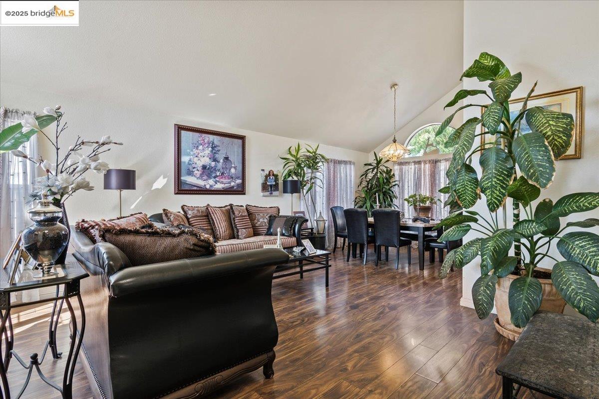 4137 Amargosa Drive Antioch, CA 94531 - Photo 6 of 31 a living room with furniture a potted plant and open to kitchen view