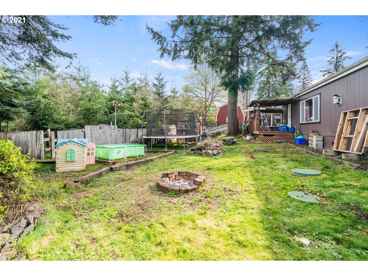 15639 South Fawn View Way Molalla, OR 97038 - Photo 11 of 11 a swimming pool with outdoor seating and yard