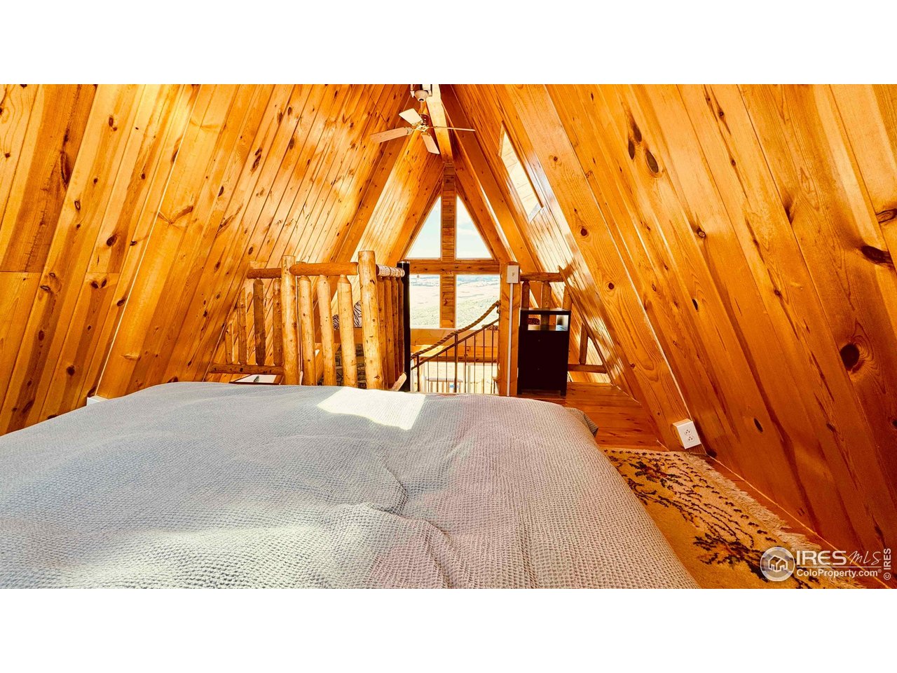 867 Windy Ridge Road Livermore, CO 80536 - Photo 12 of 23 a open area with a small yard