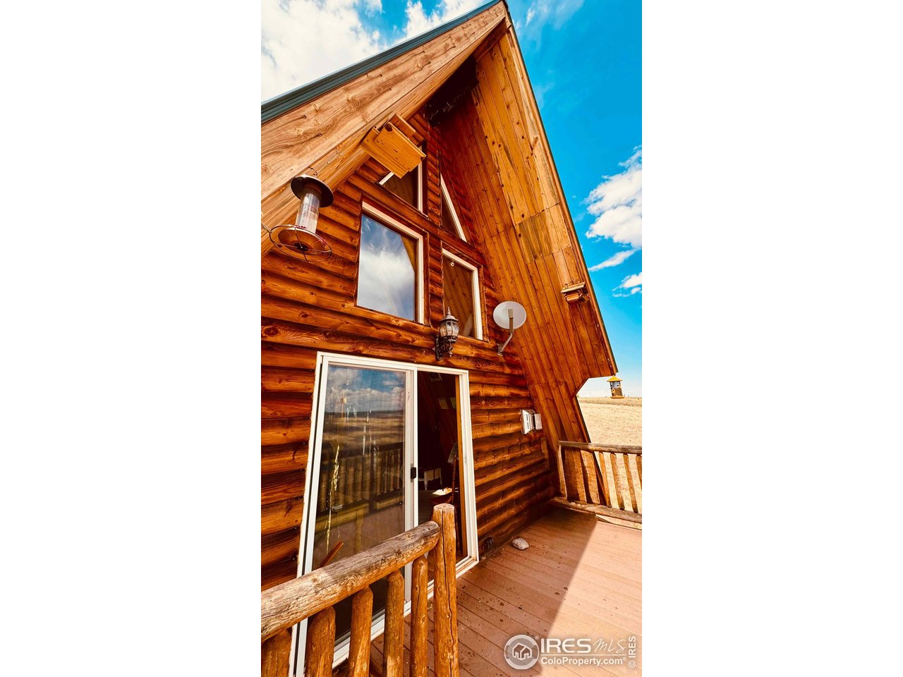 867 Windy Ridge Road Livermore, CO 80536 - Photo 5 of 23 a view of a building with a door