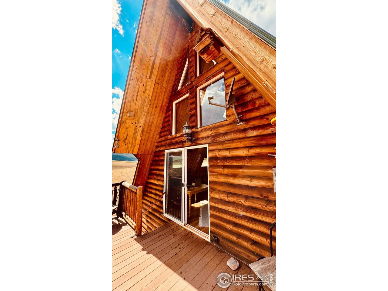 867 Windy Ridge Road Livermore, CO 80536 - Photo 6 of 23 a front view of a house