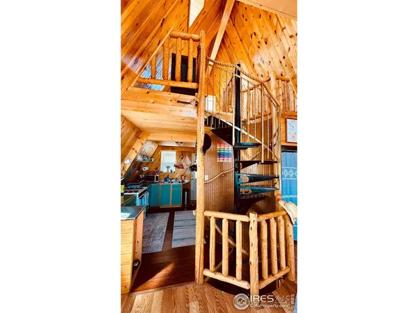 a view of balcony with wooden floor