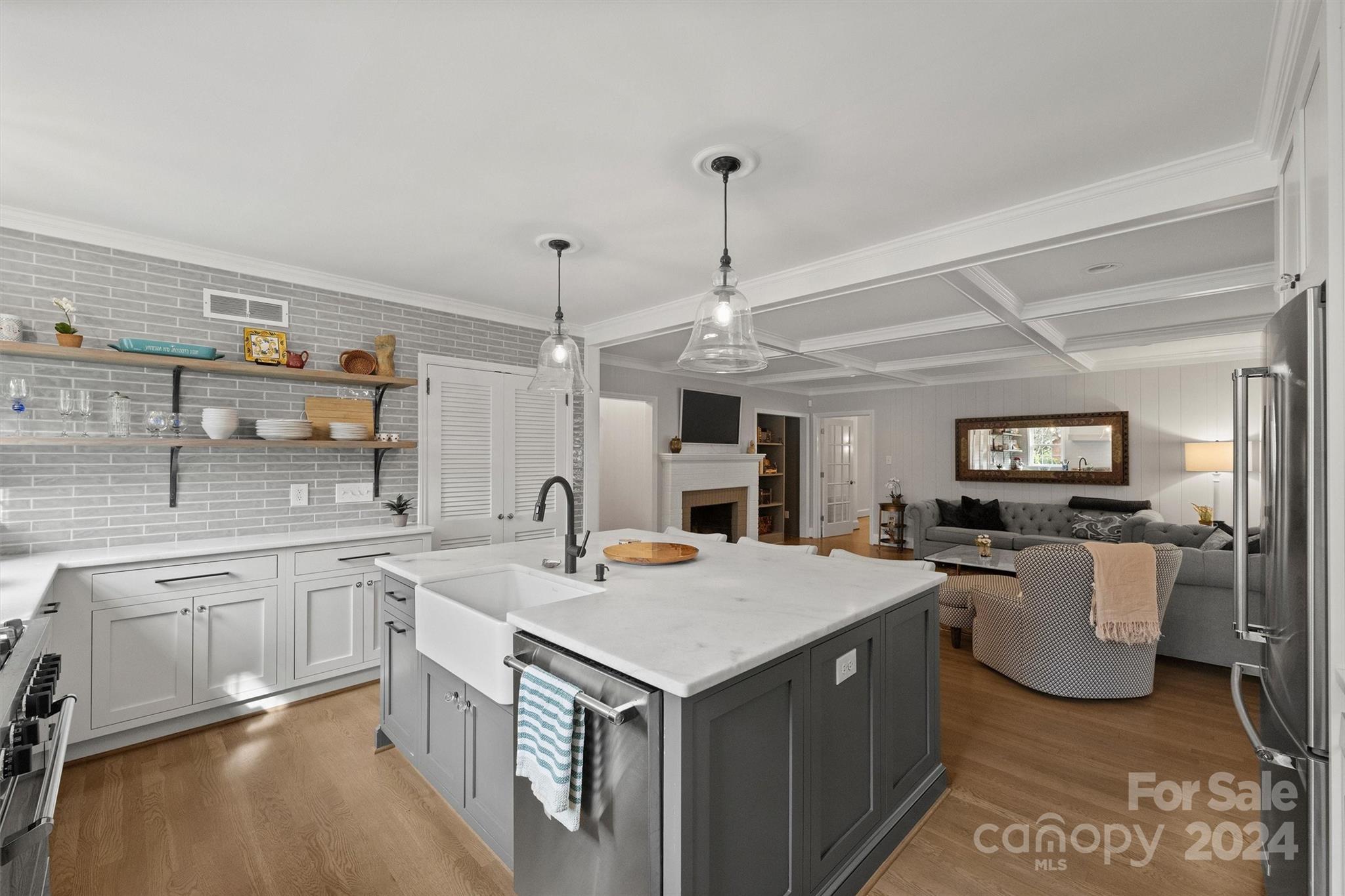101 Sardis View Road Charlotte, NC 28211 - Photo 15 of 43 a kitchen that has a sink a stove top oven a granite counter space and a sink