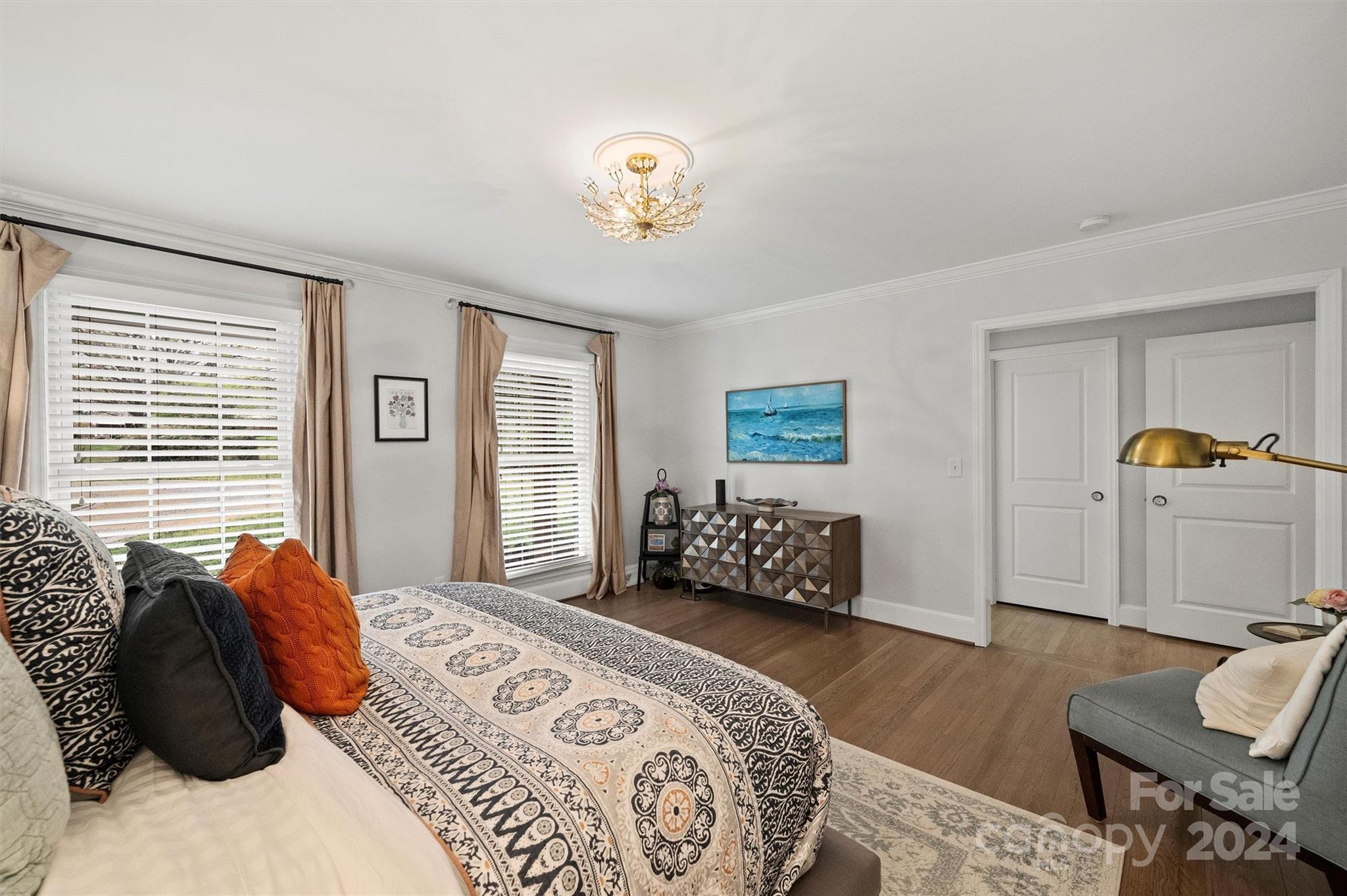 101 Sardis View Road Charlotte, NC 28211 - Photo 19 of 43 a bedroom with a bed and wooden floor