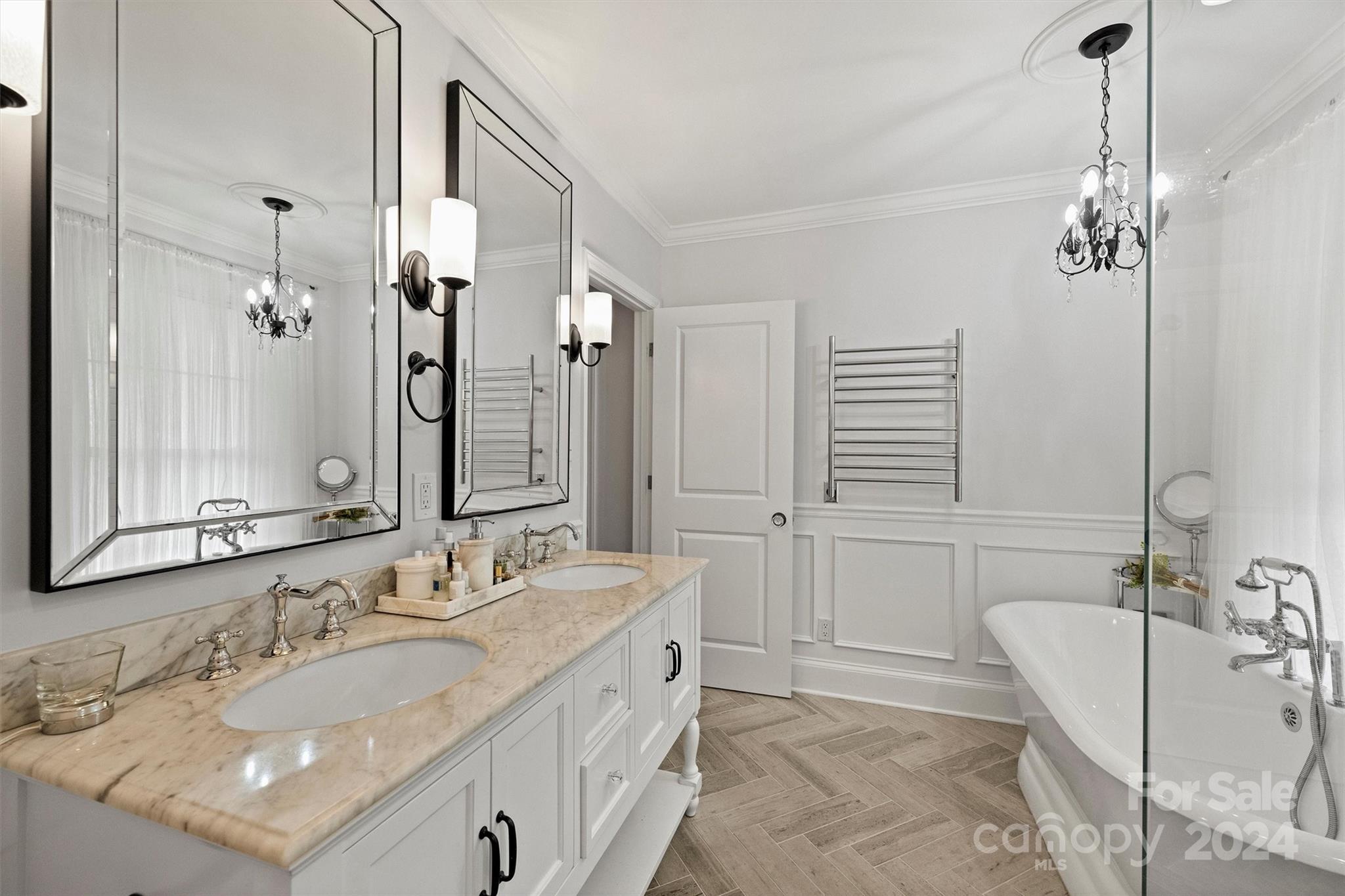 101 Sardis View Road Charlotte, NC 28211 - Photo 21 of 43 a bathroom with a double vanity sink large mirror and a bathtub