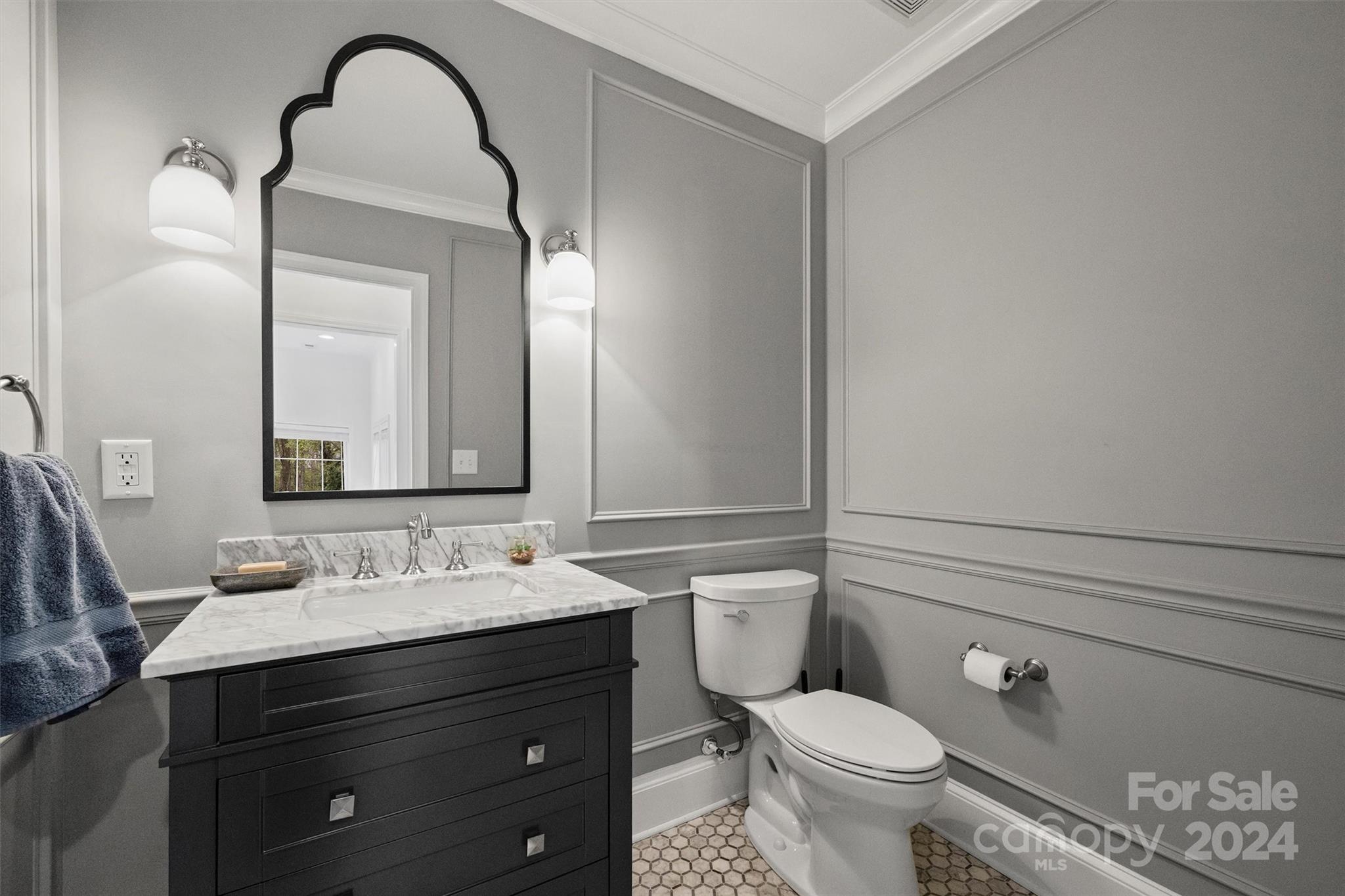 101 Sardis View Road Charlotte, NC 28211 - Photo 31 of 43 a bathroom with a toilet sink and mirror