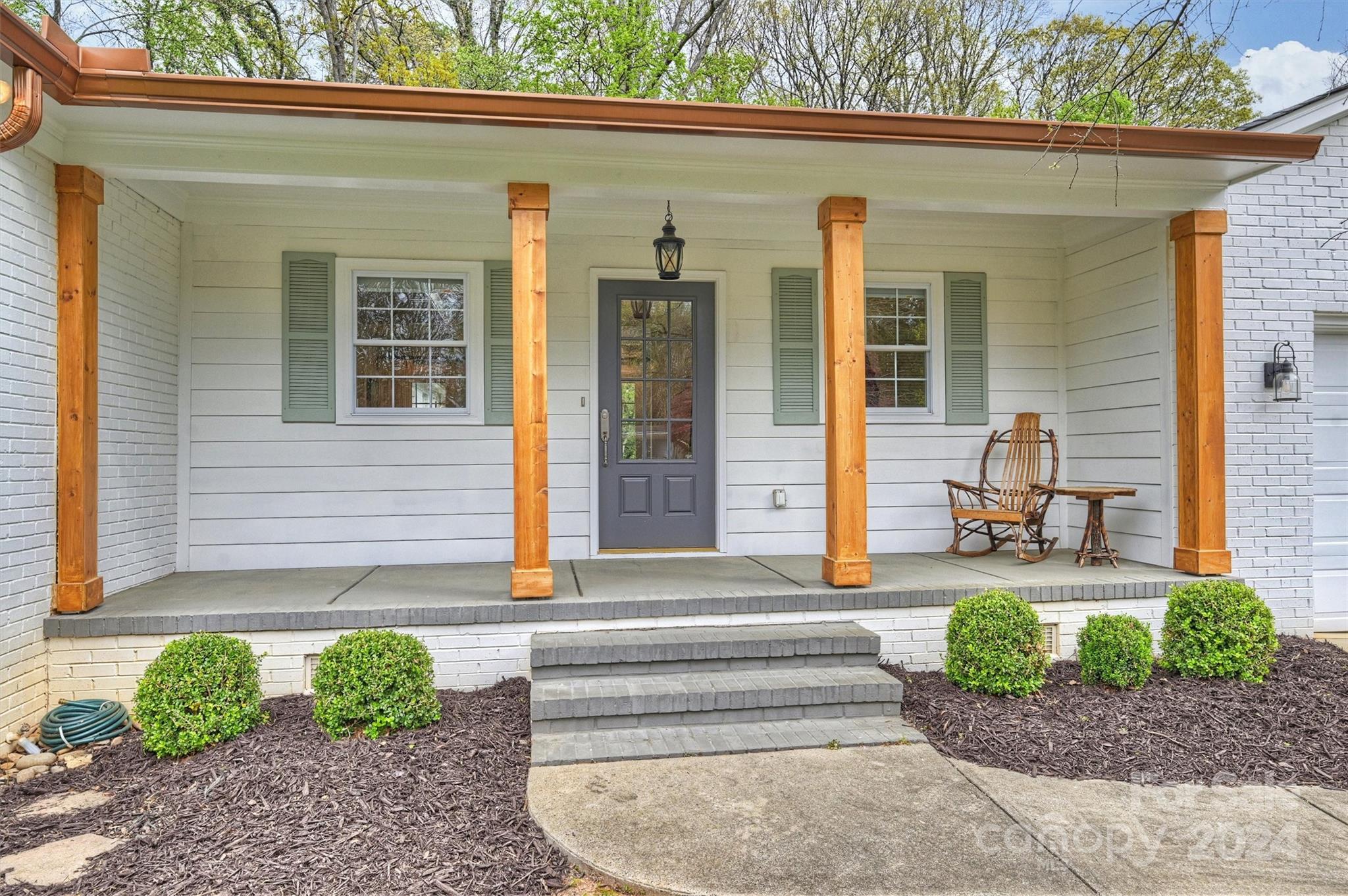 101 Sardis View Road Charlotte, NC 28211 - Photo 43 of 43 a front view of a house with garden