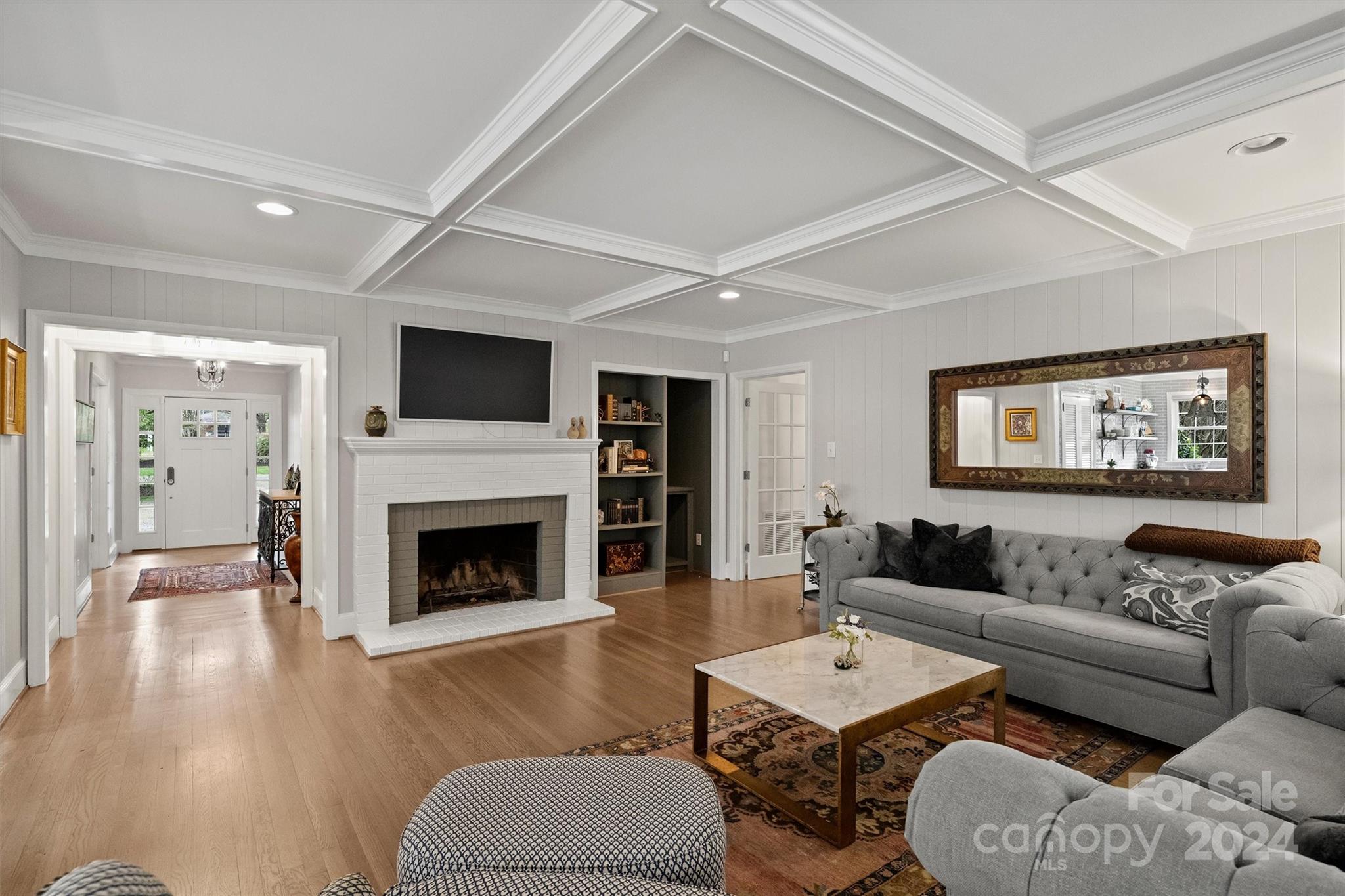 101 Sardis View Road Charlotte, NC 28211 - Photo 6 of 43 a living room with furniture a fireplace and a flat screen tv