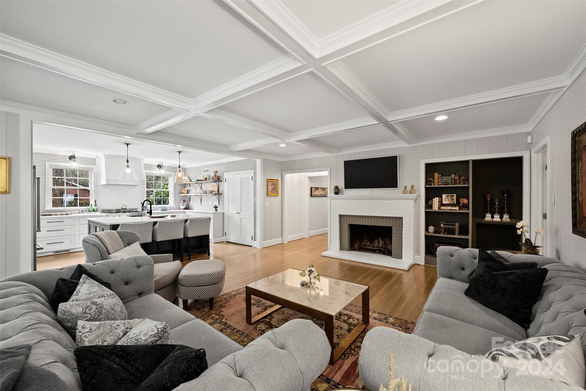 101 Sardis View Road Charlotte, NC 28211 - Photo 7 of 43 a living room with furniture a fireplace and a flat screen tv
