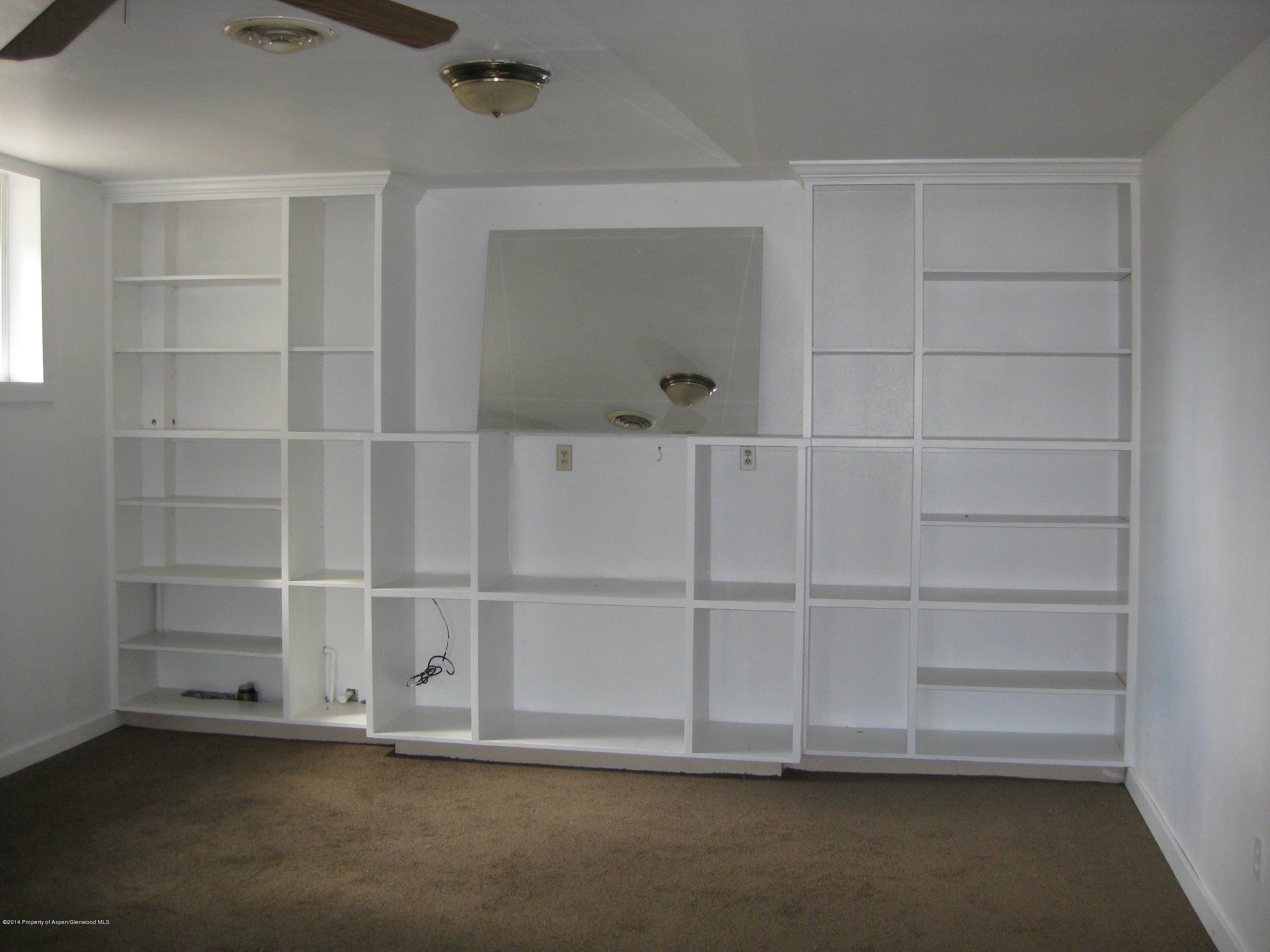 653 East 7th Street Rifle, CO 81650 - Photo 8 of 16 a view of a room with rack on the wall
