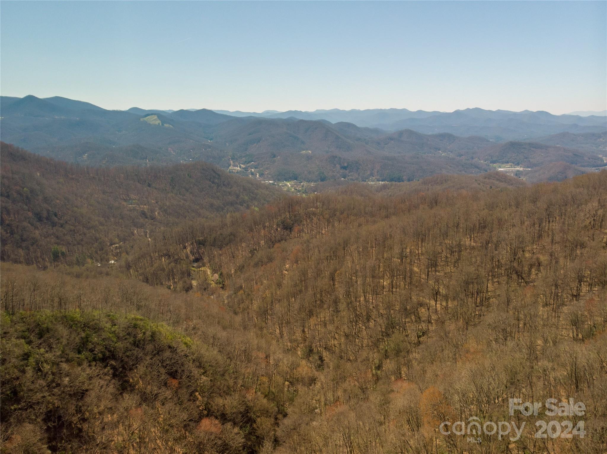 0 Buff Creek Road Sylva, NC 28779 - Photo 3 of 21 a view of a mountain range in a cloudy sky