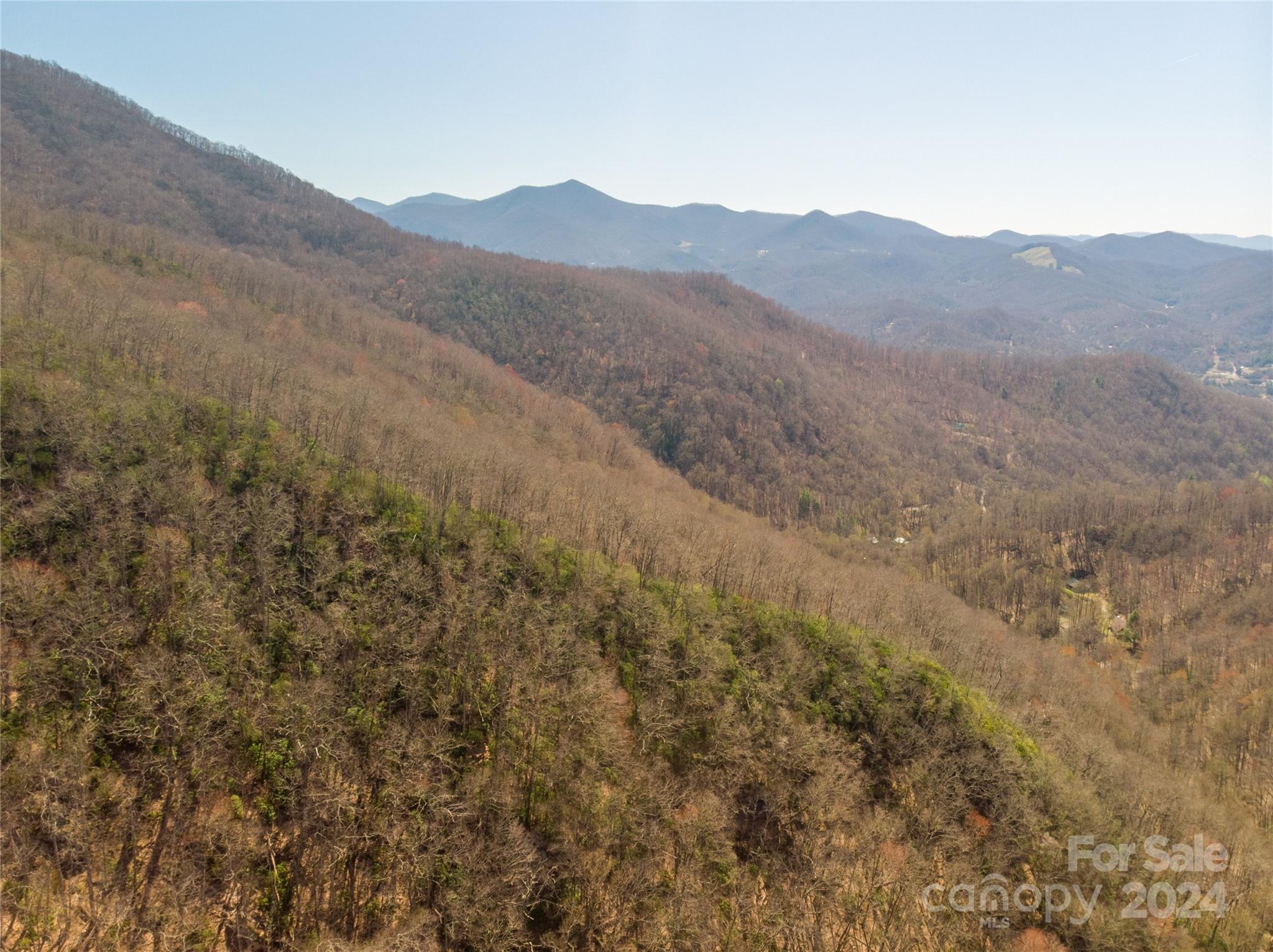0 Buff Creek Road Sylva, NC 28779 - Photo 5 of 21 a view of a town with mountains in the background