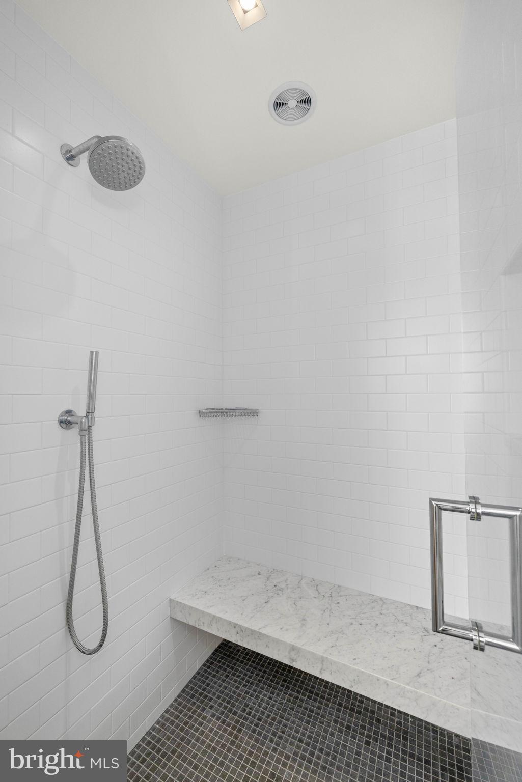 2912 Dumbarton Street Northwest Washington, DC 20007 - Photo 12 of 22 a bathroom with a shower