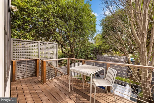 a view of a yard with chairs