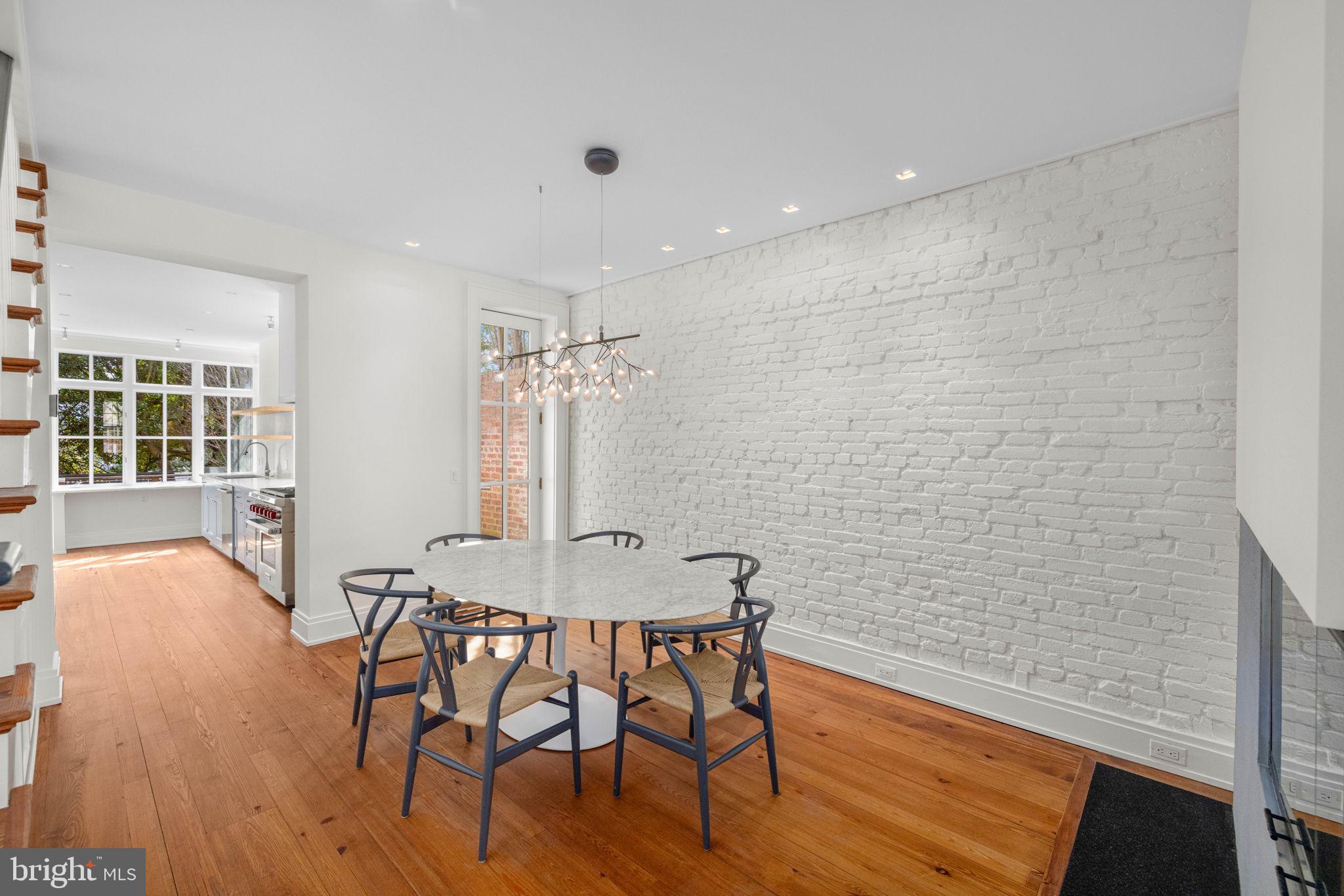 2912 Dumbarton Street Northwest Washington, DC 20007 - Photo 6 of 22 a view of a dining room with furniture and wooden floor