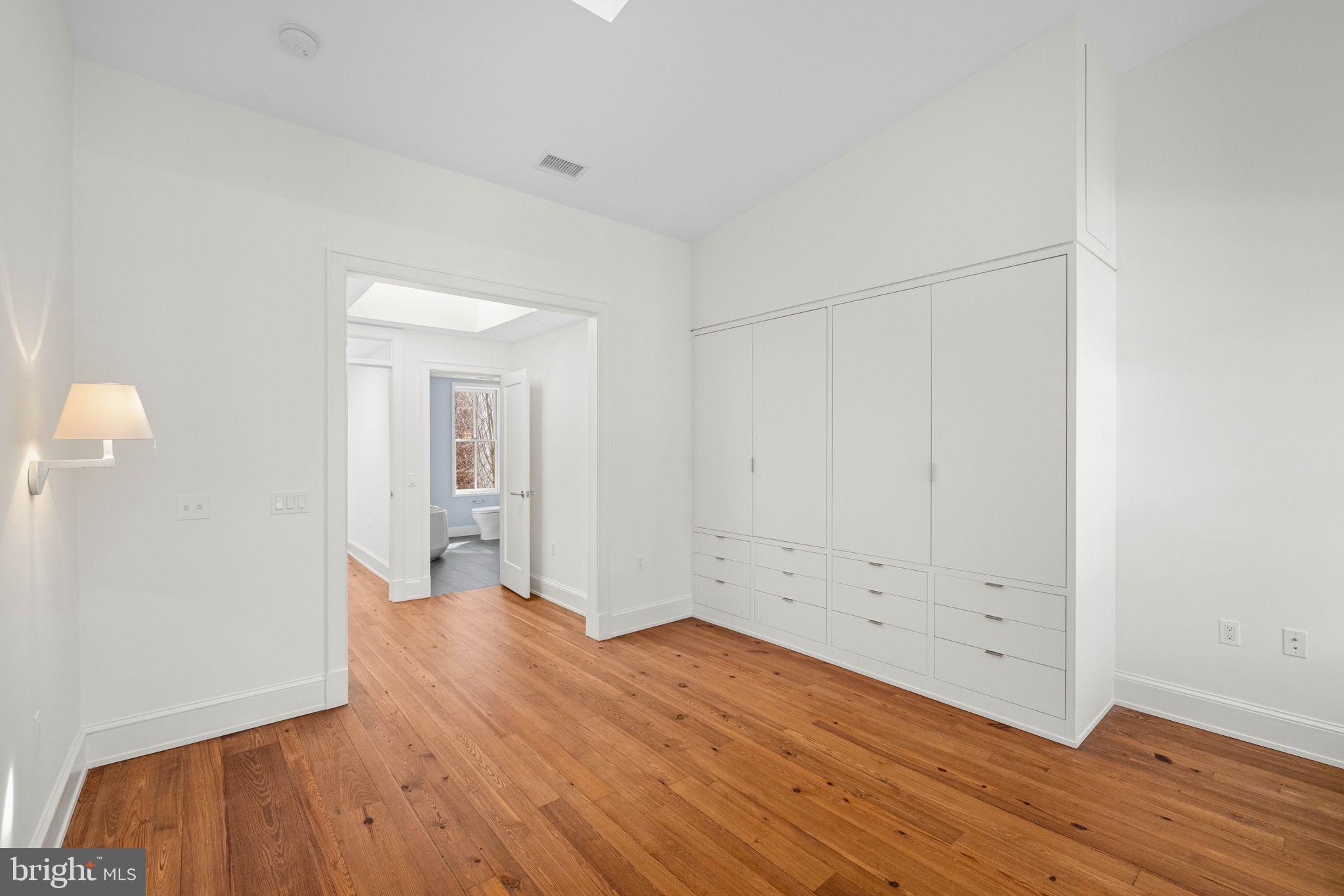 2912 Dumbarton Street Northwest Washington, DC 20007 - Photo 9 of 22 a view of a room with wooden floor