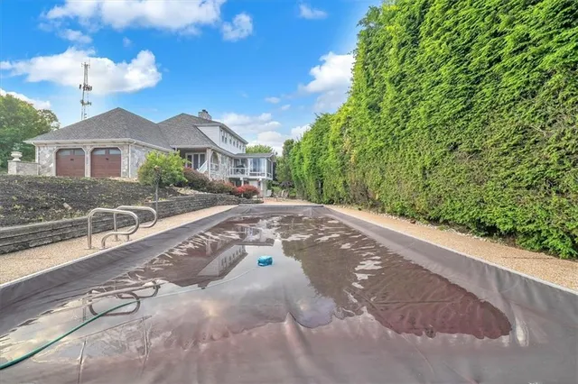 a front view of a house with a garage
