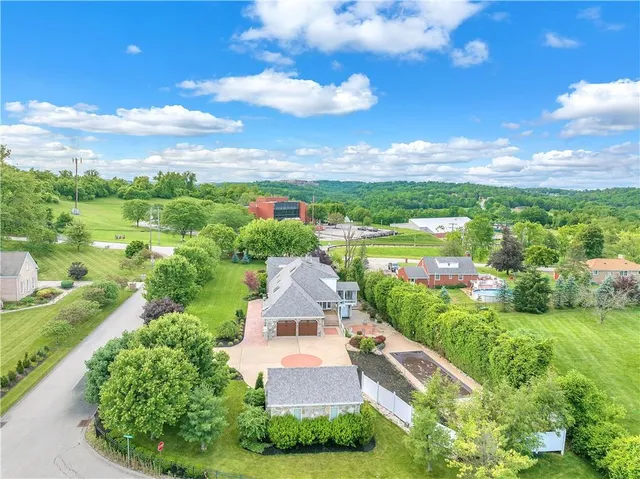 a view of a city with mountains in the background