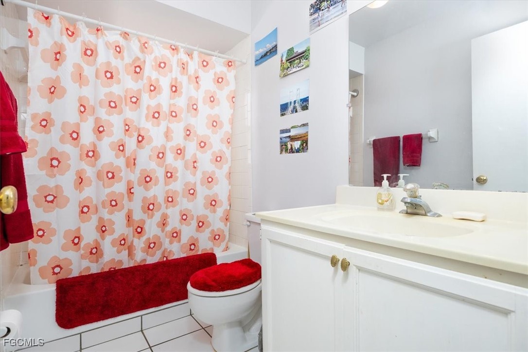 7261 Albany Road Fort Myers, FL 33967 - Photo 23 of 27 a bathroom with a sink toilet and shower