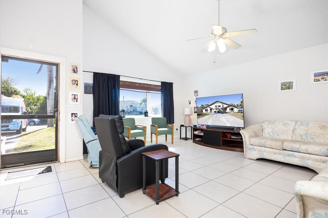7261 Albany Road Fort Myers, FL 33967 - Photo 27 of 27 a living room with furniture and a flat screen tv