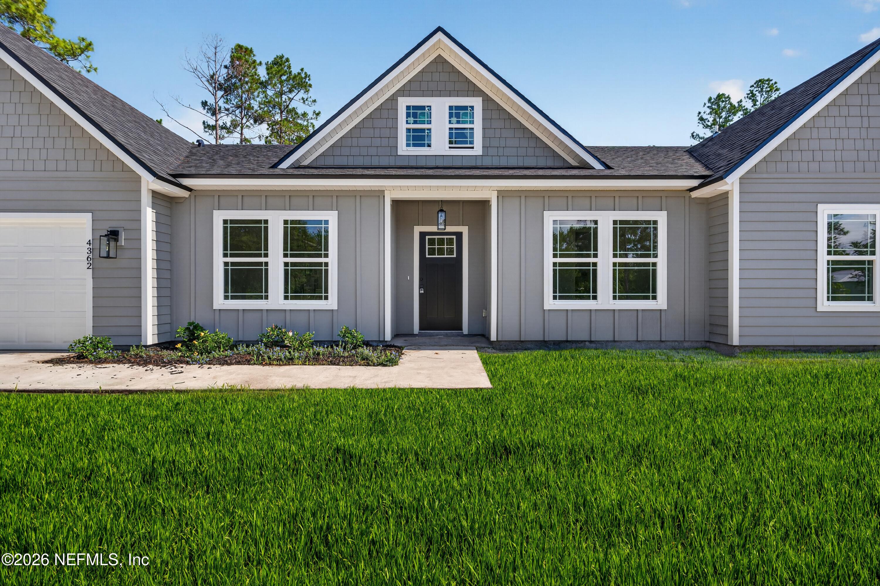 4362 Angora Street Middleburg, FL 32068 - Photo 2 of 31 front view of a house with a yard