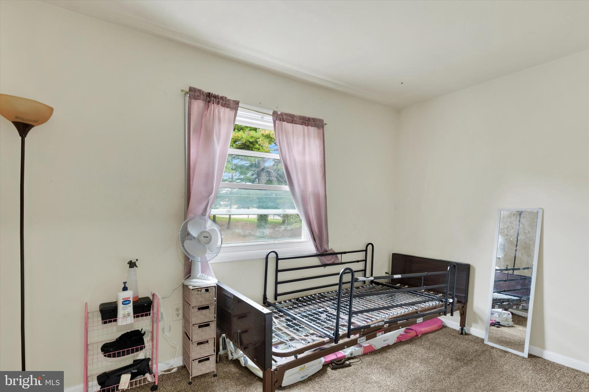 1211 Wabank Street Lancaster, PA 17603 - Photo 13 of 26 a bedroom with furniture and a window