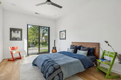 a bathroom with double sink and a mirror