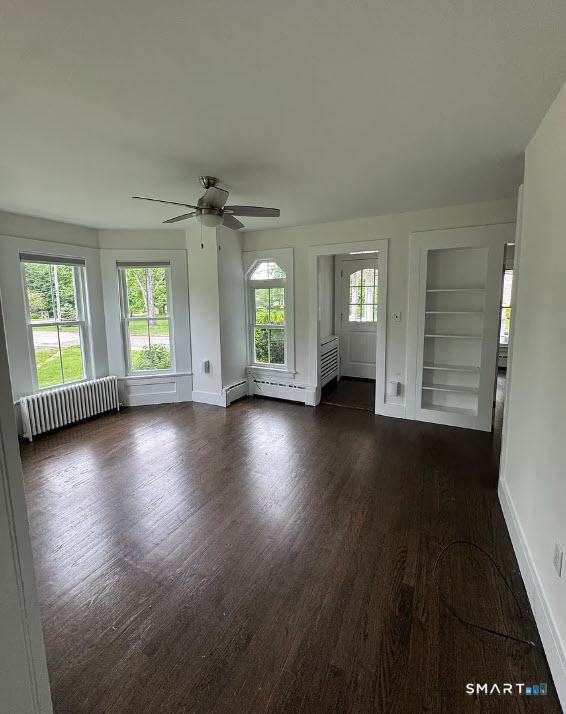 25 Drive Way Guilford, CT 06437 - Photo 9 of 24 With gleaming hardwood floors and an abundance of natural light!