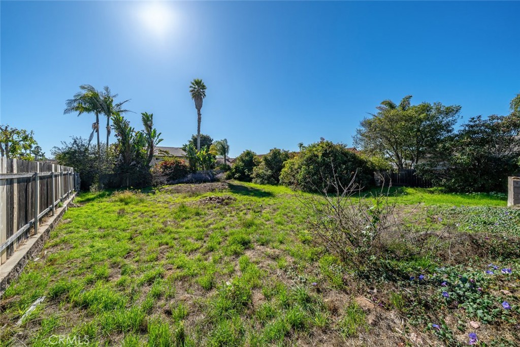 1362 Farroll Road Grover Beach, CA 93433 - Photo 12 of 13 a view of a garden with a fountain