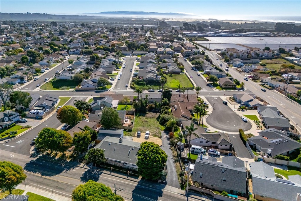 1362 Farroll Road Grover Beach, CA 93433 - Photo 3 of 13 an aerial view of residential houses with outdoor space
