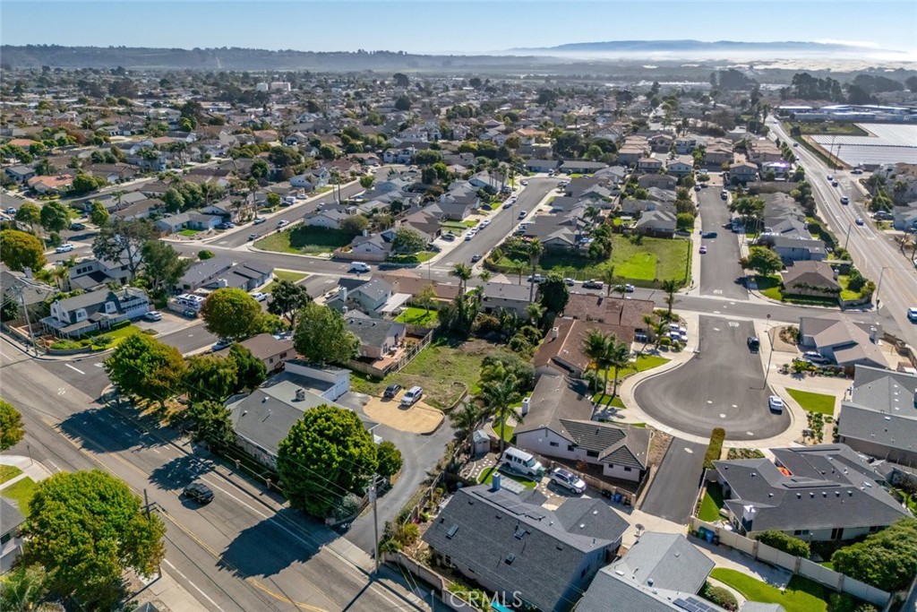 1362 Farroll Road Grover Beach, CA 93433 - Photo 4 of 13 an aerial view of a city