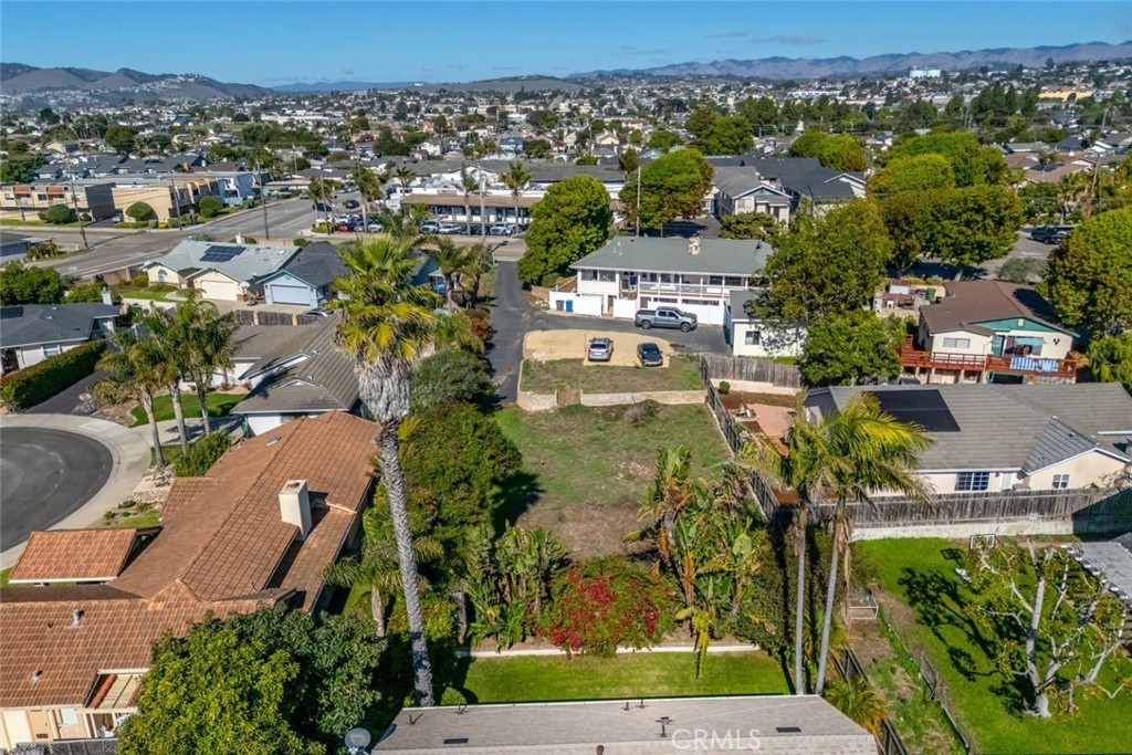 1362 Farroll Road Grover Beach, CA 93433 - Photo 6 of 13 an aerial view of residential houses with outdoor space and trees