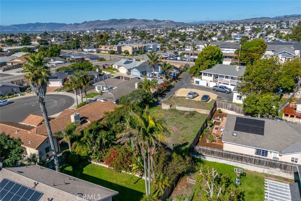 1362 Farroll Road Grover Beach, CA 93433 - Photo 7 of 13 an aerial view of a house with a garden